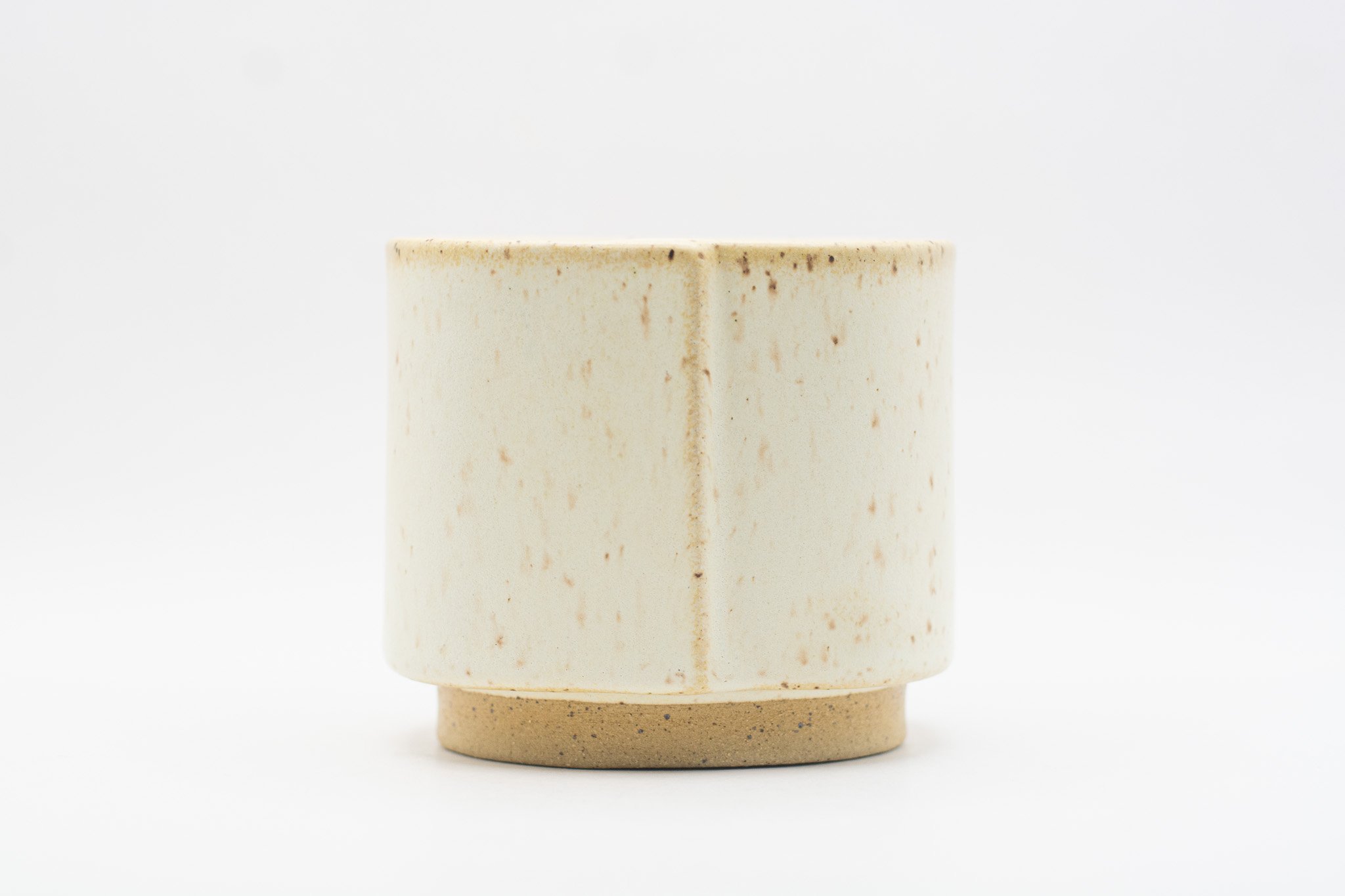 Handmade ceramic mug with rounded rectangular form